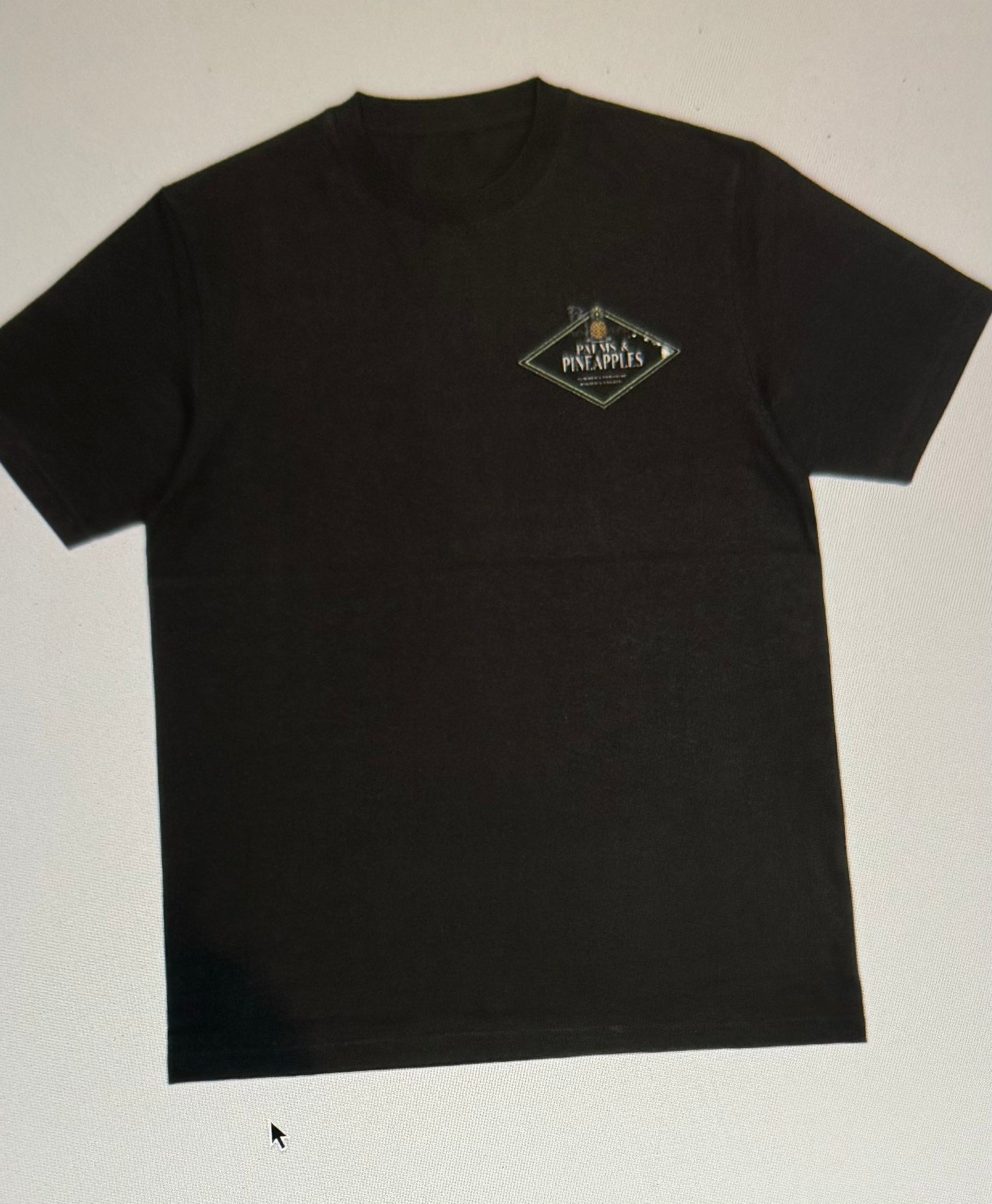 Palms & Pineapples “Summer’s Paradise, Winter’s Escape” T-Shirt